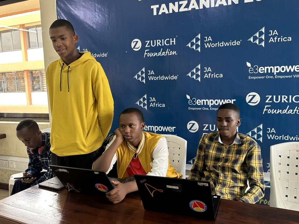 Students at E3Empower with laptops