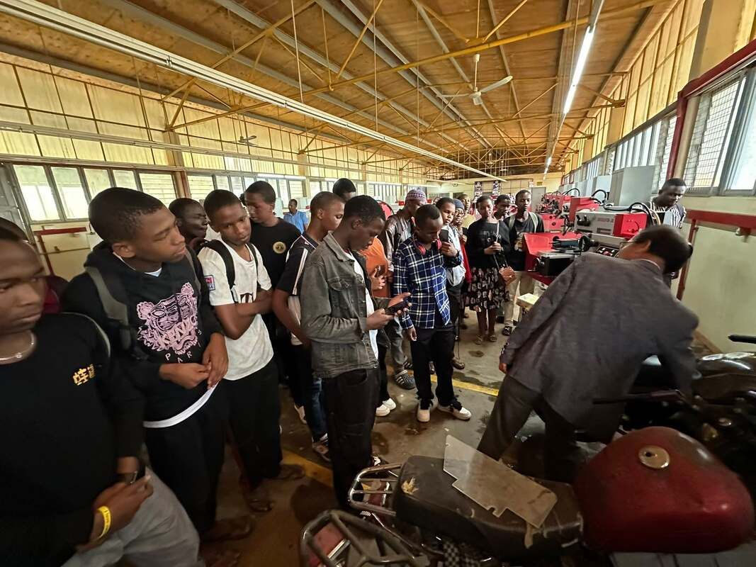 A crowd of students at a workshop in Tanzania